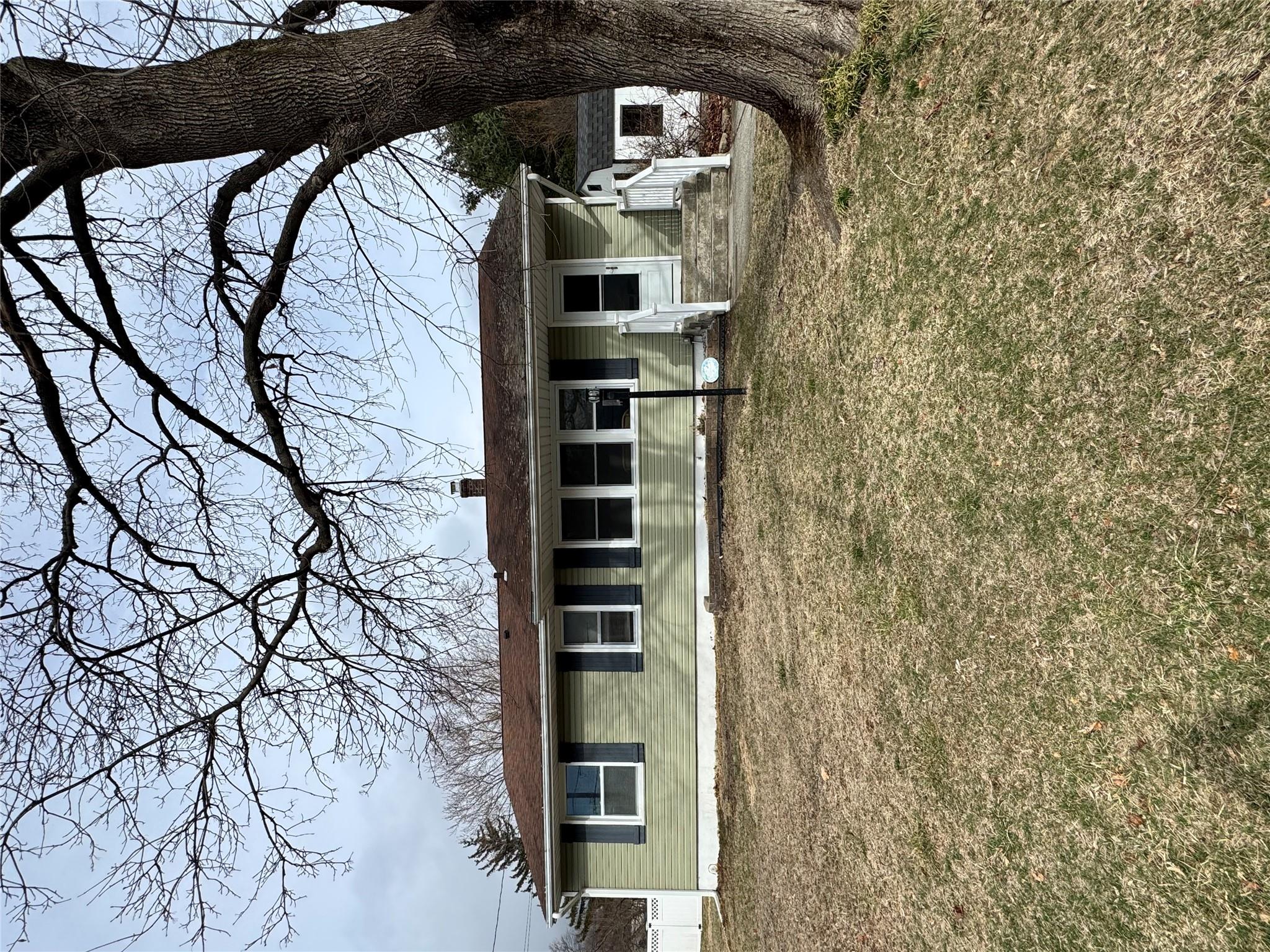 22 Putnam Road Fishkill, NY 12524 - Photo 1 of 1 a front view of a house with a garden