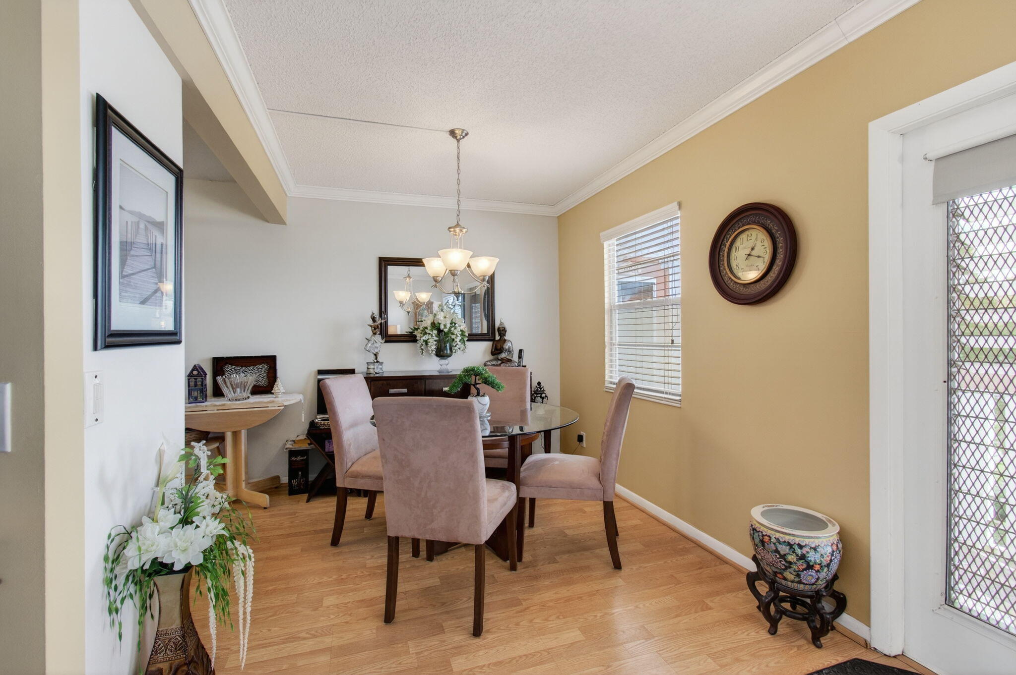 4082 Wolverton East Boca Raton, FL 33434 - Photo 11 of 93 a view of a dining room with furniture and a chandelier