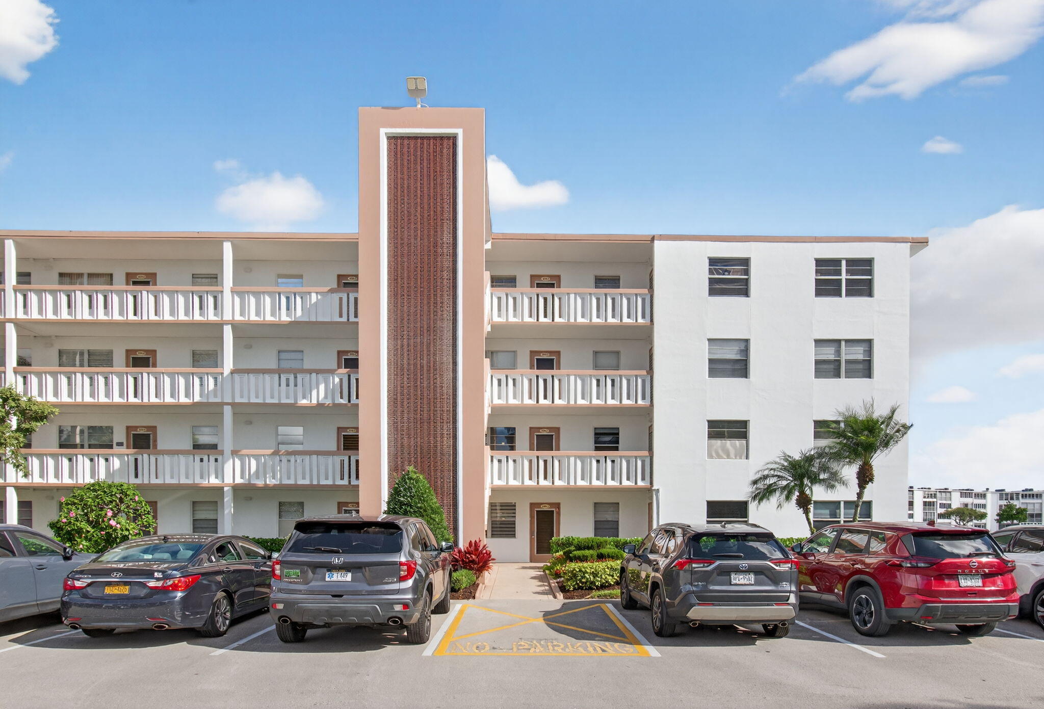 4082 Wolverton East Boca Raton, FL 33434 - Photo 2 of 93 a car parked in front of a building
