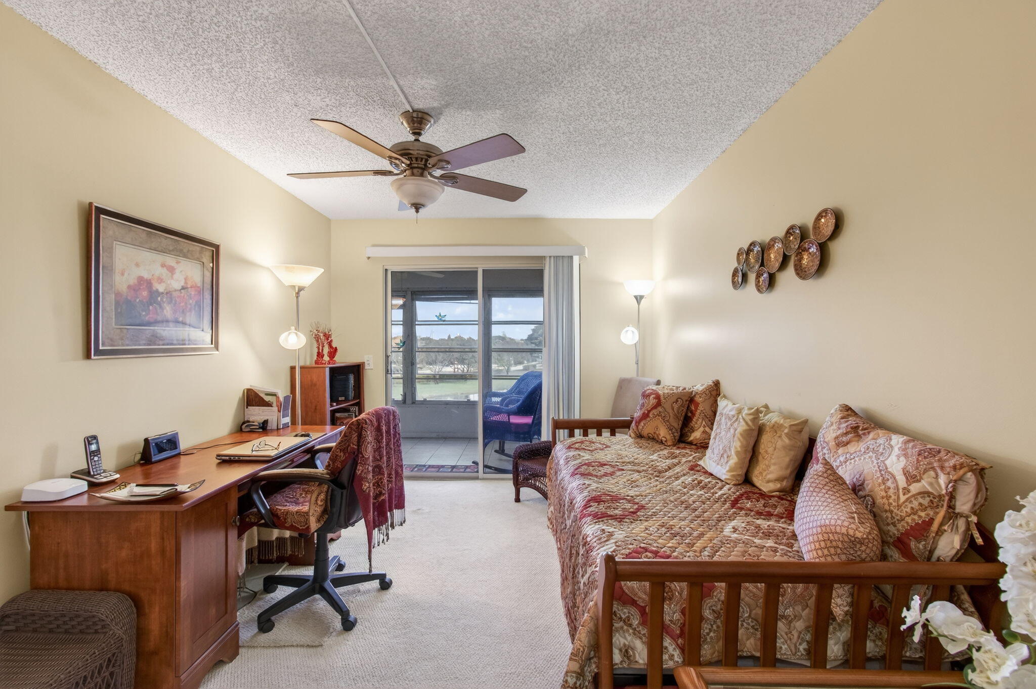 4082 Wolverton East Boca Raton, FL 33434 - Photo 33 of 93 a living room with furniture a chandelier fan and a window