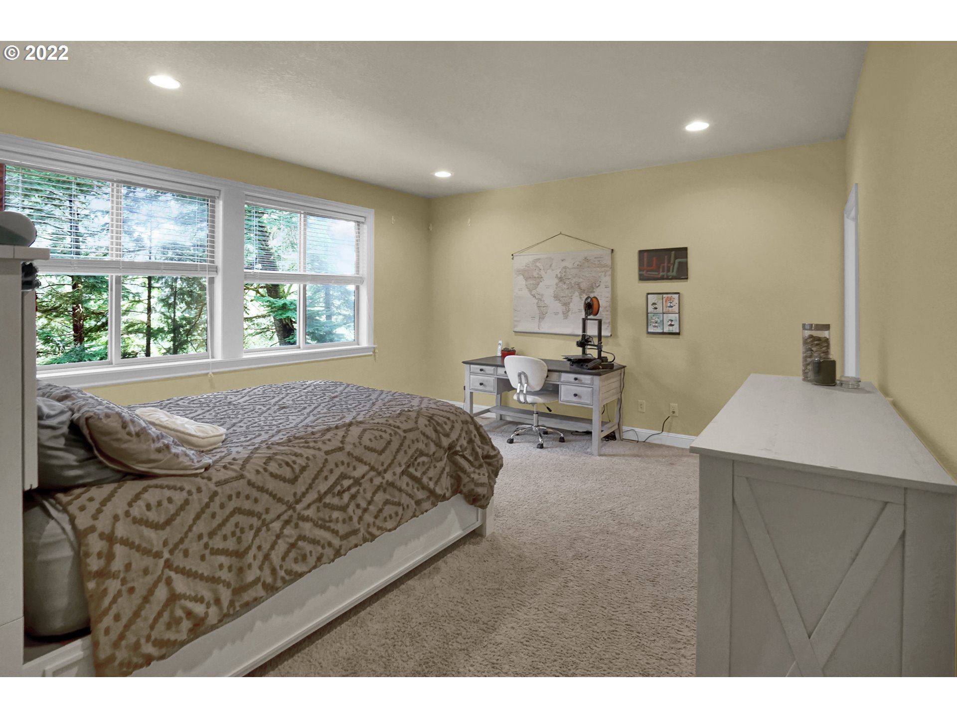 11 Big Tree Road Gleneden Beach, OR 97388 - Photo 21 of 32 a bedroom with a bed a table and chair