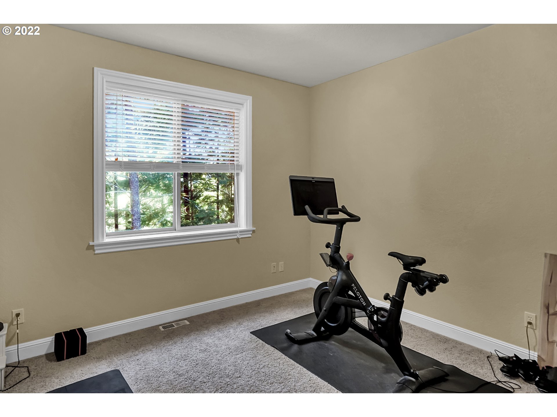11 Big Tree Road Gleneden Beach, OR 97388 - Photo 24 of 32 a room with gym equipment and a window