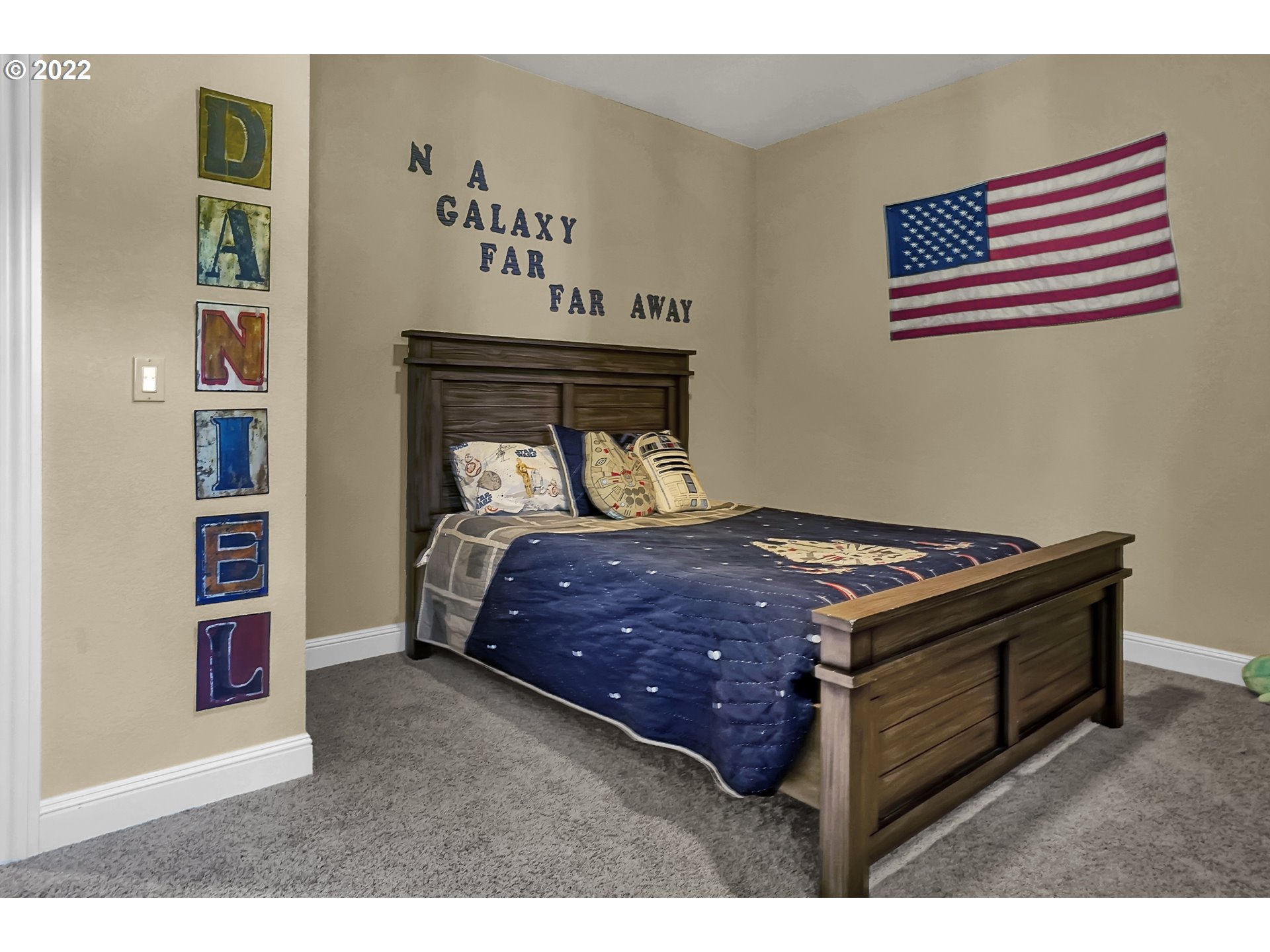 11 Big Tree Road Gleneden Beach, OR 97388 - Photo 27 of 32 a bedroom with a bed and cabinets
