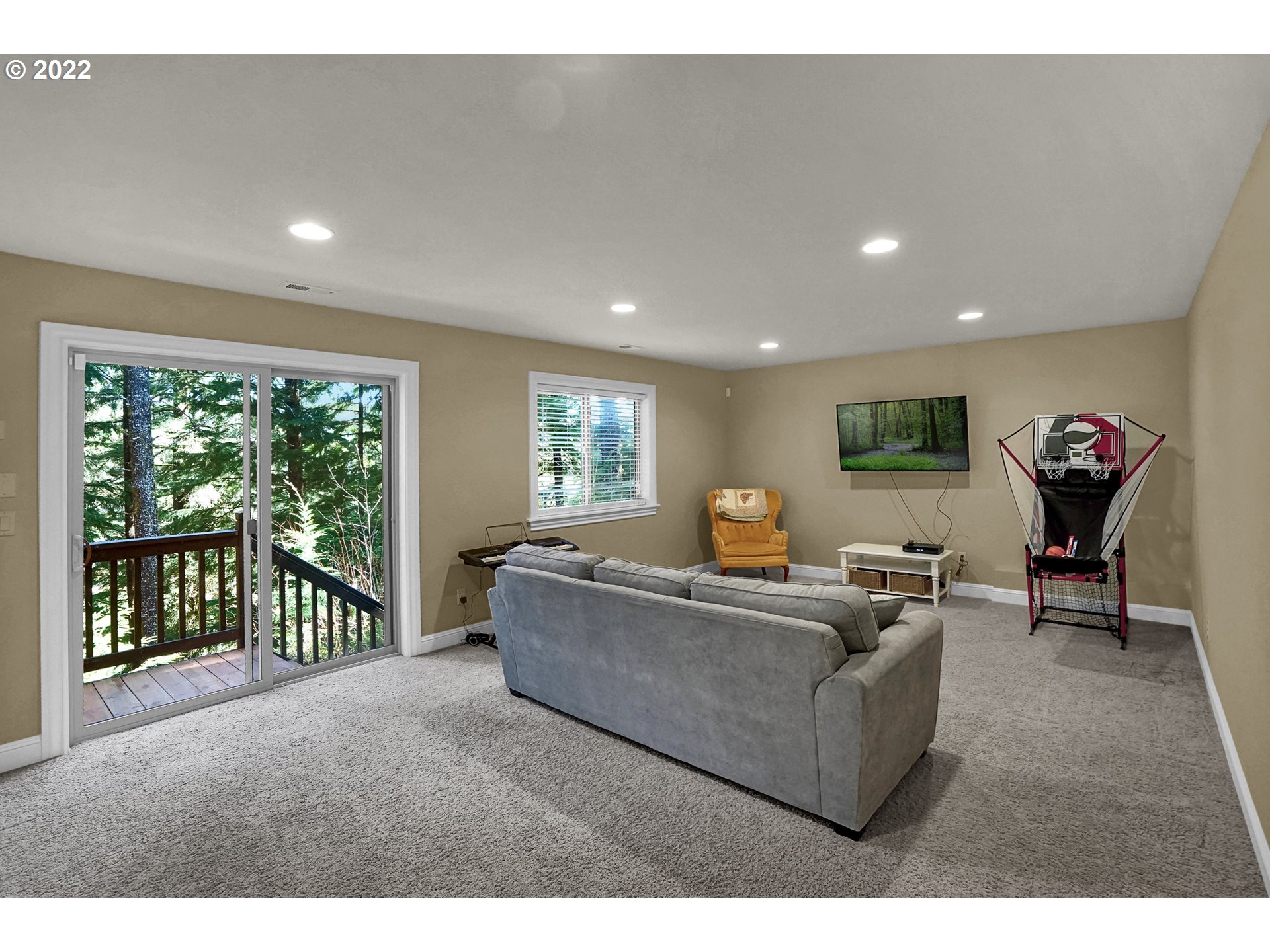 11 Big Tree Road Gleneden Beach, OR 97388 - Photo 28 of 32 a living room with furniture and a large window