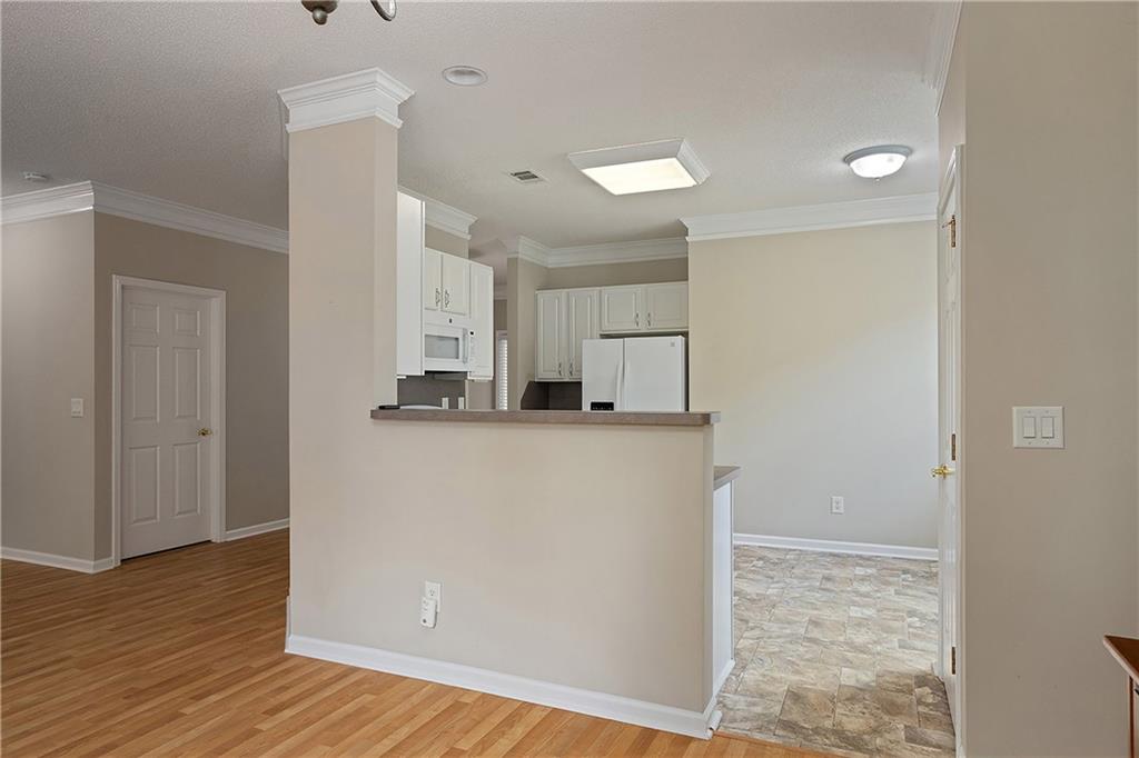 17 Williams Pride Way Newnan, GA 30265 - Photo 12 of 28 a view of a kitchen with wooden floor