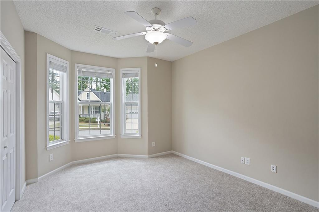 17 Williams Pride Way Newnan, GA 30265 - Photo 17 of 28 a view of an empty room with a window