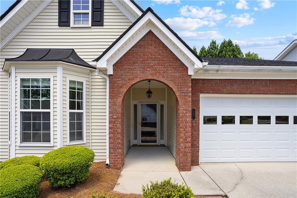17 Williams Pride Way Newnan, GA 30265 - Photo 2 of 28 a view of a house with more windows and a small yard