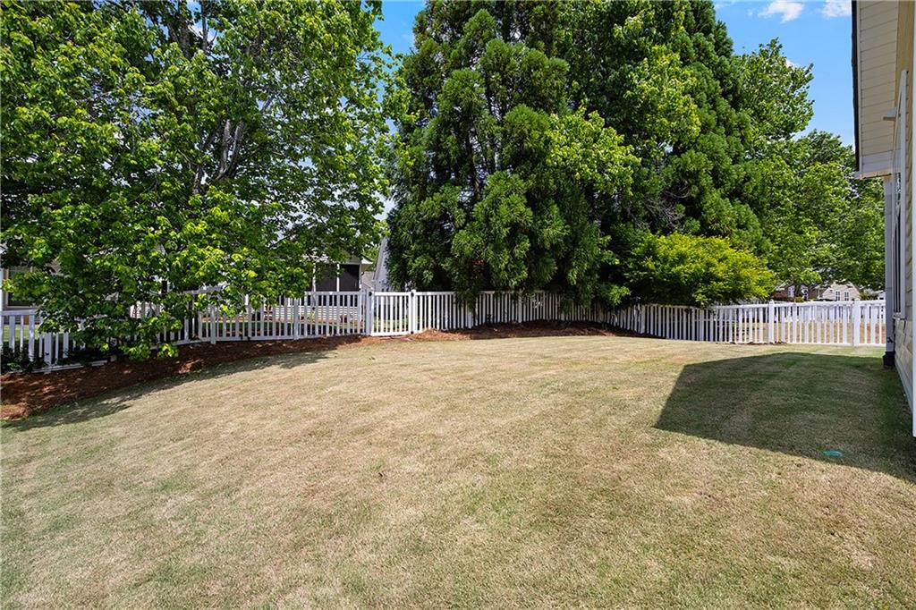 17 Williams Pride Way Newnan, GA 30265 - Photo 23 of 28 a view of backyard and tree