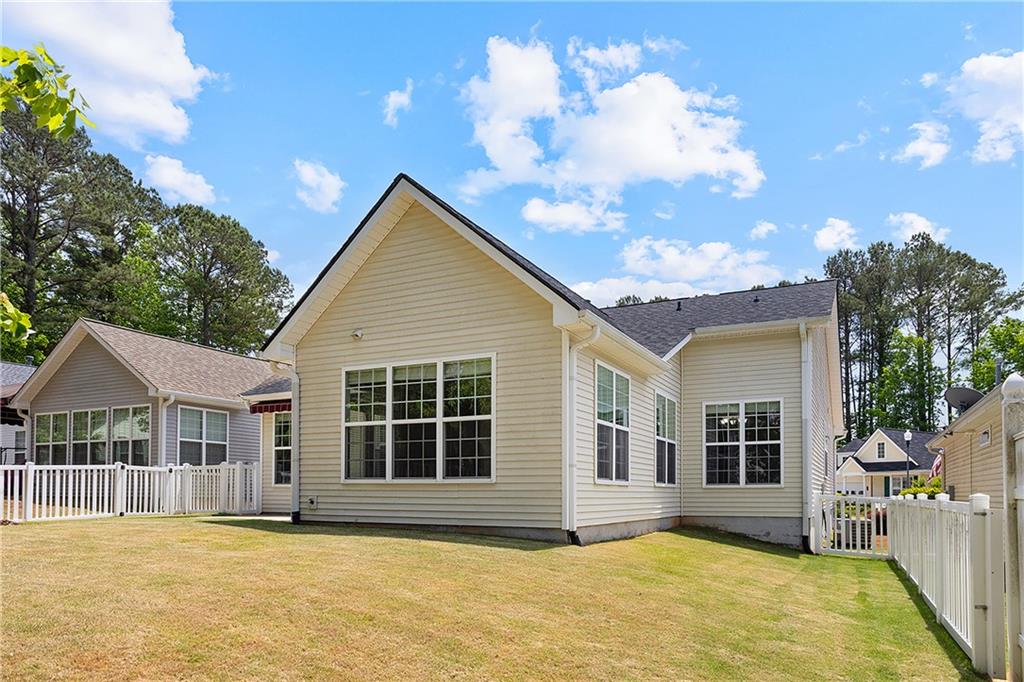 17 Williams Pride Way Newnan, GA 30265 - Photo 25 of 28 a view of a house with a swimming pool and porch
