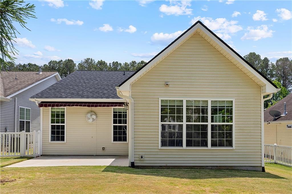 17 Williams Pride Way Newnan, GA 30265 - Photo 28 of 28 a view of a house with a swimming pool and a yard