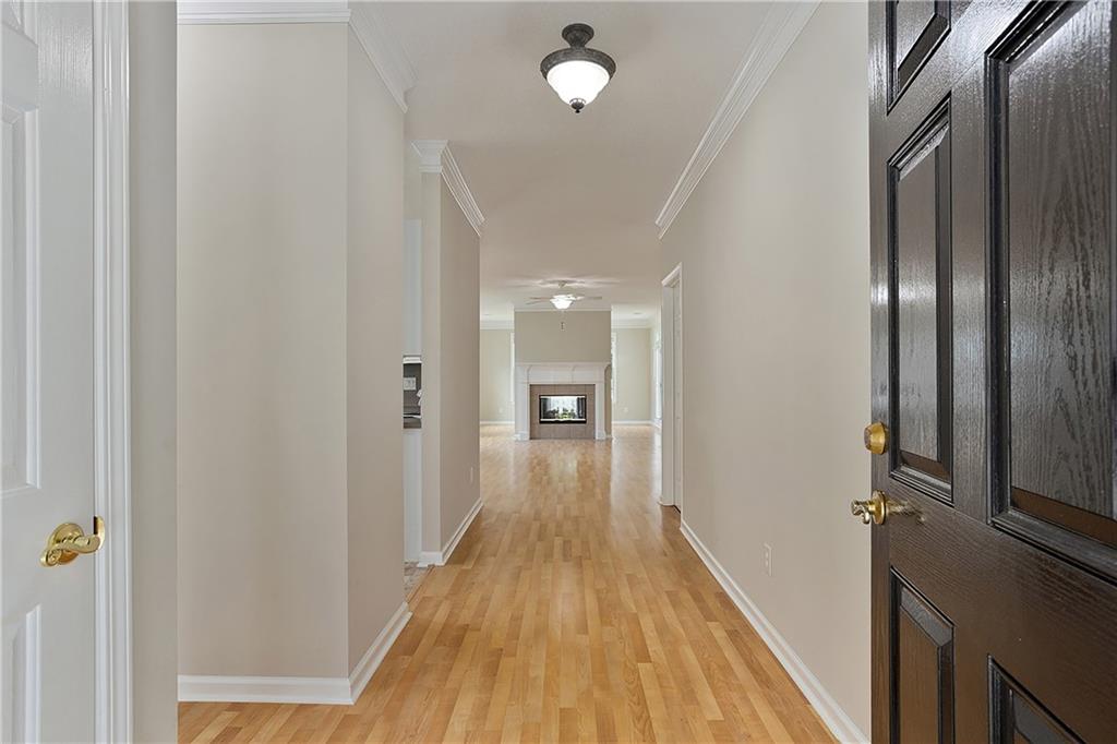 17 Williams Pride Way Newnan, GA 30265 - Photo 3 of 28 a view of a hallway with wooden floor