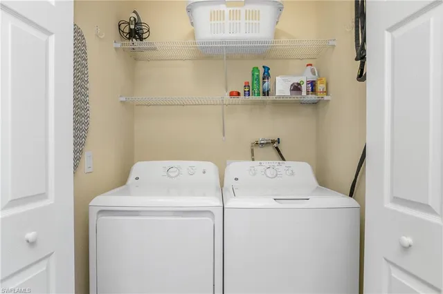 a utility room with dryer and washer