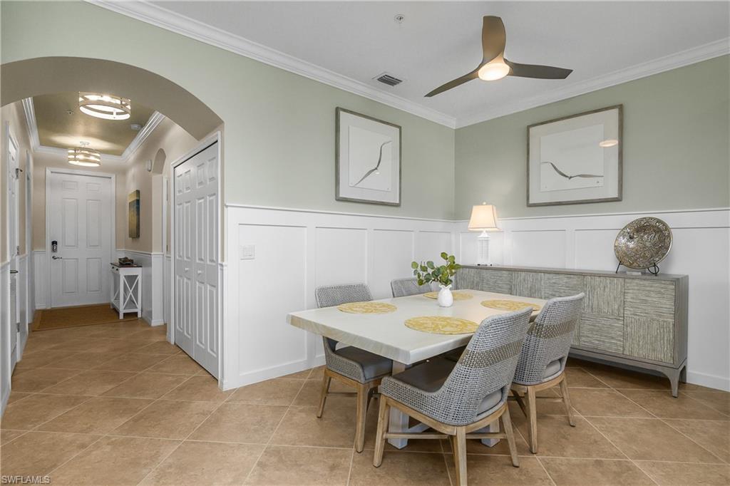 9834 Giaveno Circle, Unit 1746 Naples, FL 34113 - Photo 6 of 41 a view of a dining room with furniture