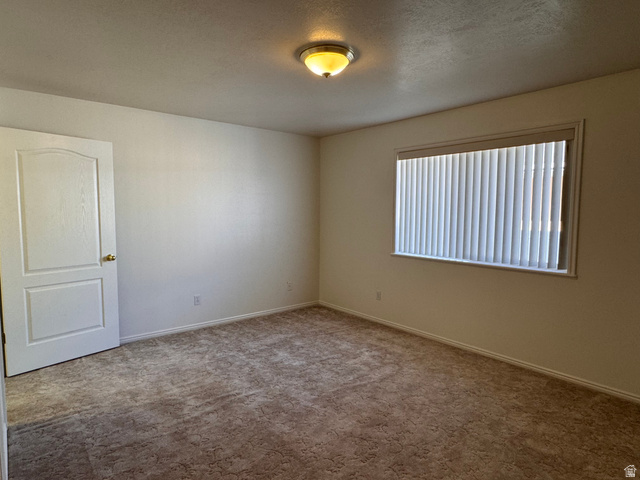 461 Topaz Boulevard, Unit 6 Delta, UT 84624 - Photo 20 of 45 Primary bedroom on main level