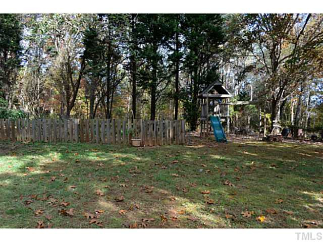 9936 Baileywick Road Raleigh, NC 27613 - Photo 21 of 24 Great back yard with tree swing, patio , shed and tons of room to play! Back Yard