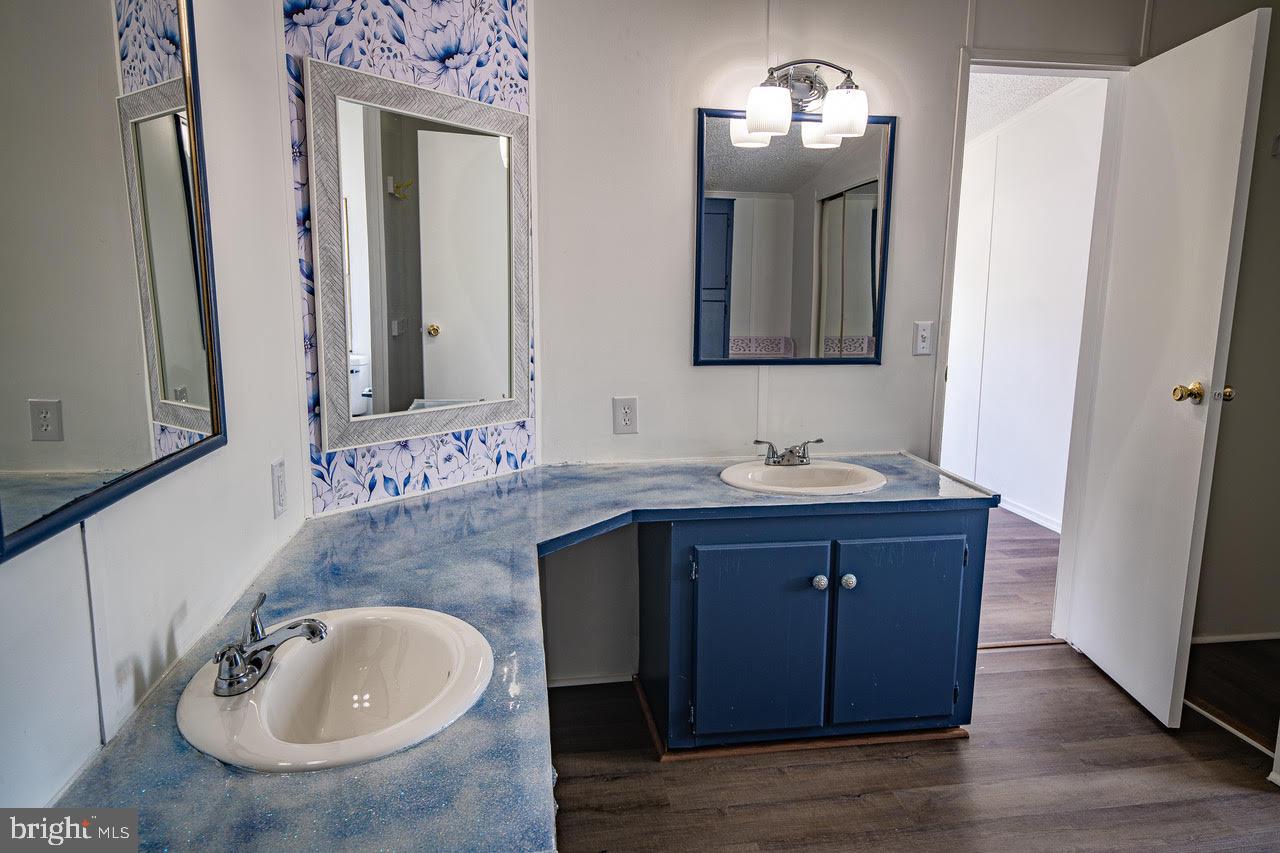 35 Bonneau Heights Road Gettysburg, PA 17325 - Photo 23 of 34 a bathroom with a sink and a mirror