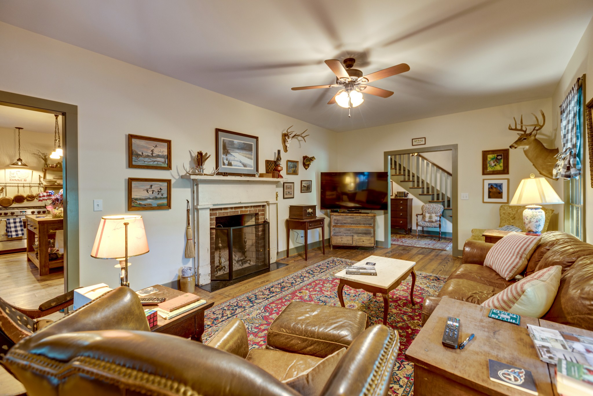 5184 Fire Tower Road Franklin, TN 37064 - Photo 12 of 53 a living room with furniture and a fireplace