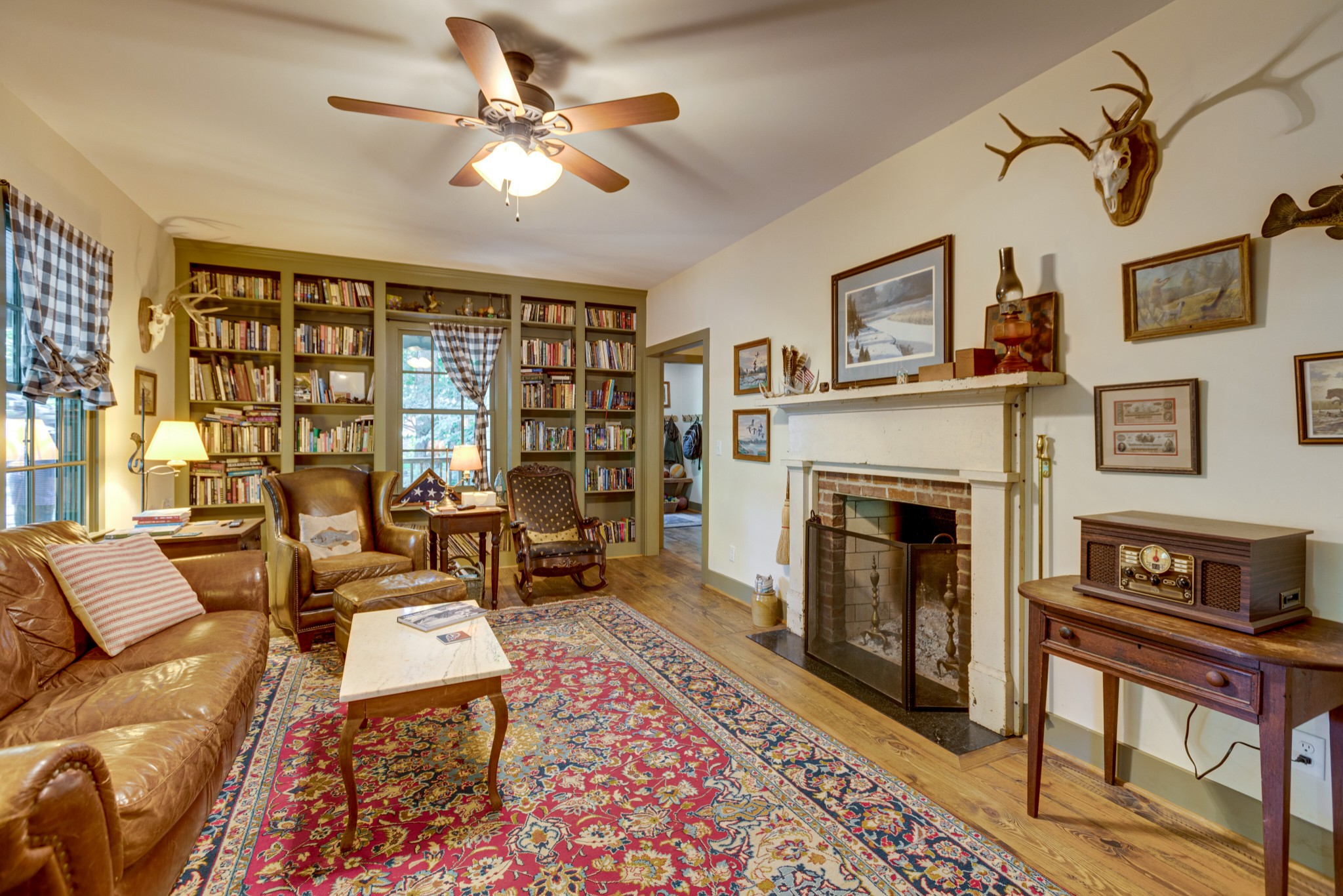 5184 Fire Tower Road Franklin, TN 37064 - Photo 13 of 53 a living room with furniture a rug and a fireplace