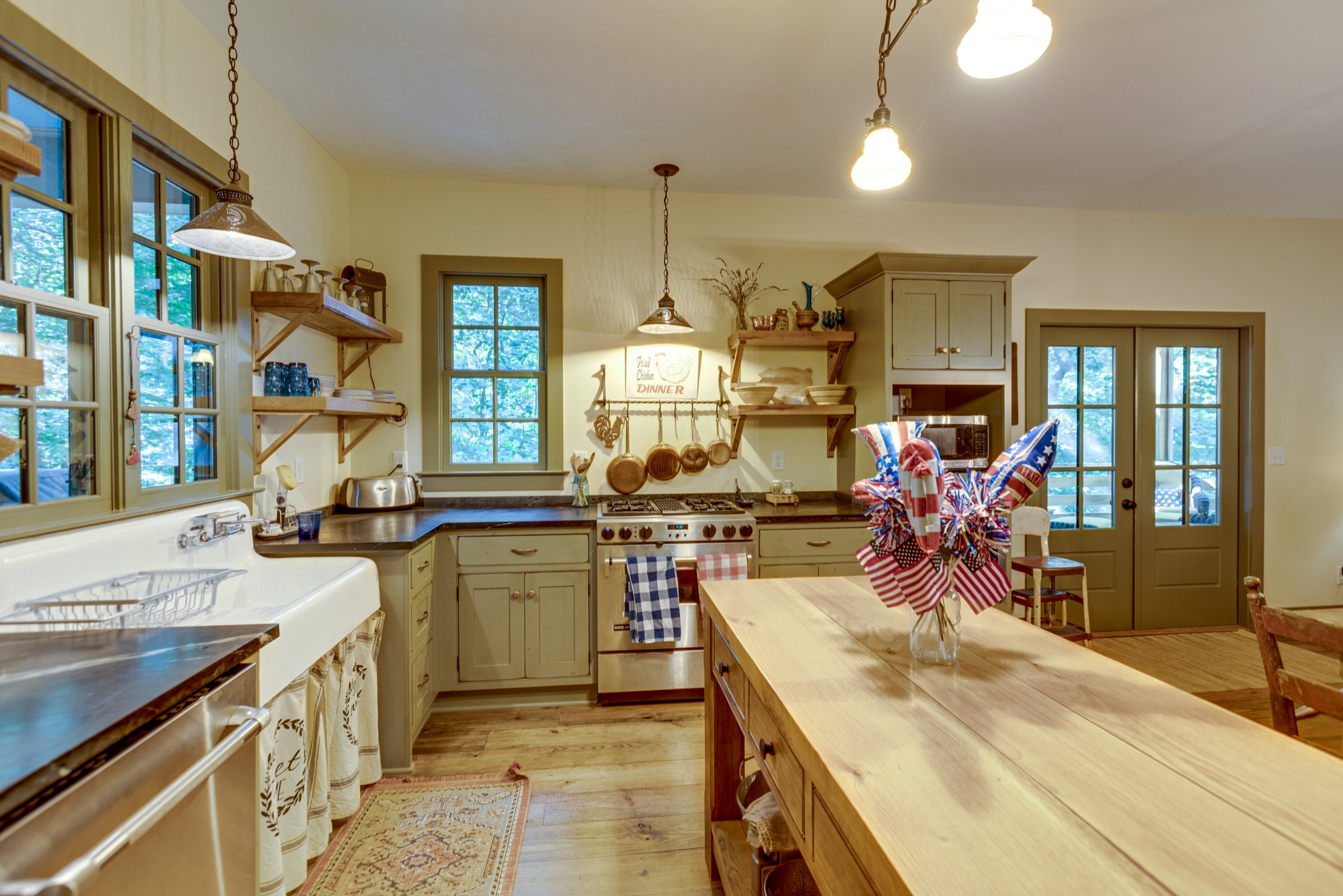 5184 Fire Tower Road Franklin, TN 37064 - Photo 20 of 53 a kitchen with a sink stove and cabinets