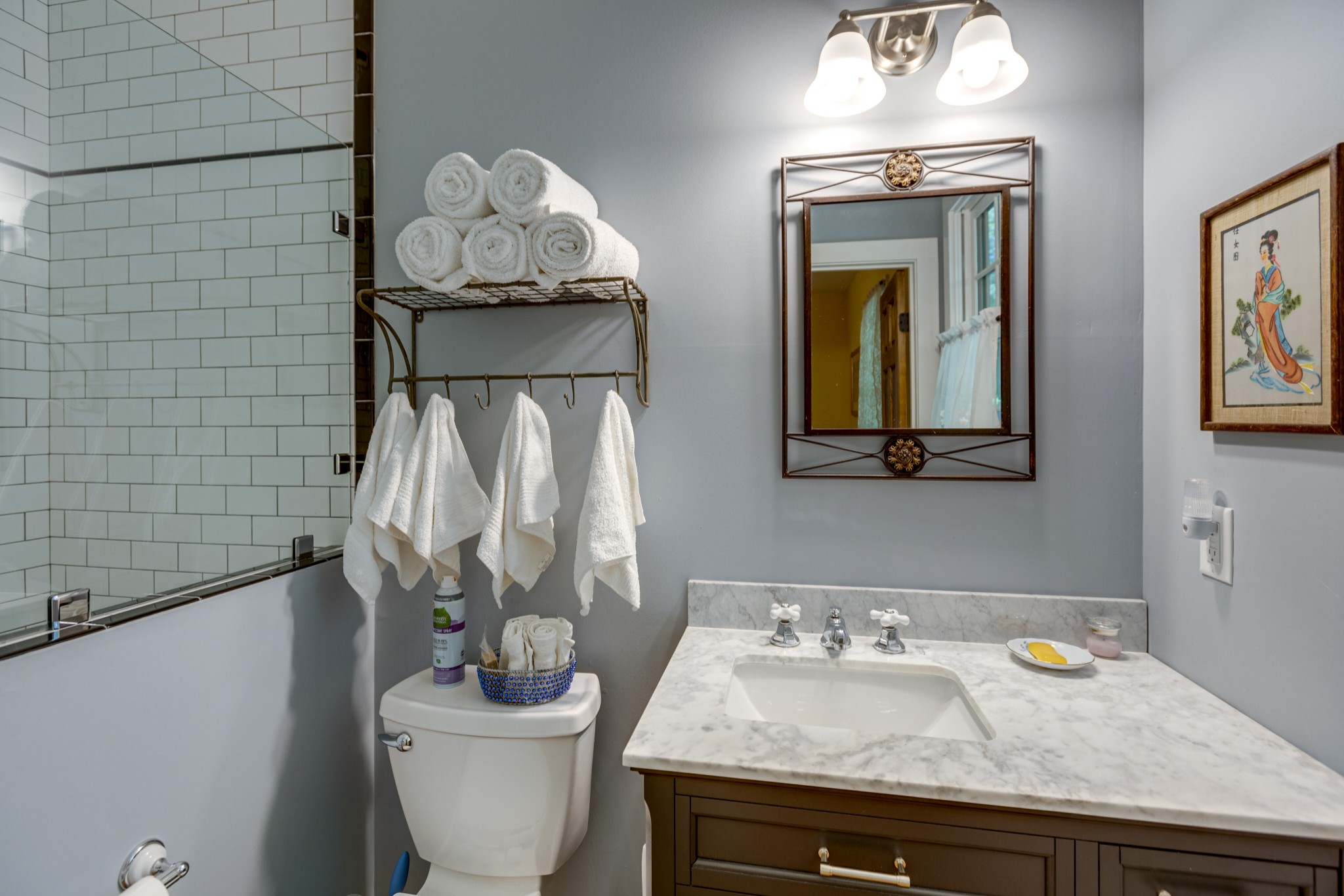 5184 Fire Tower Road Franklin, TN 37064 - Photo 26 of 53 a bathroom with a granite countertop sink a toilet and mirror