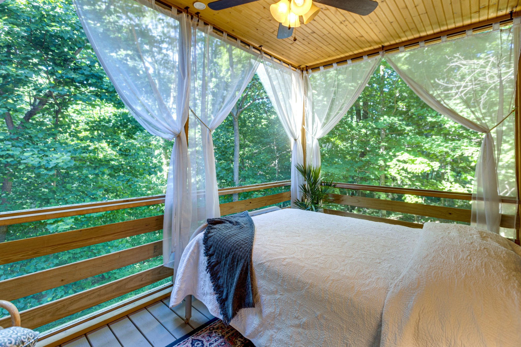 5184 Fire Tower Road Franklin, TN 37064 - Photo 28 of 53 a bed sitting in a bedroom next to a large window