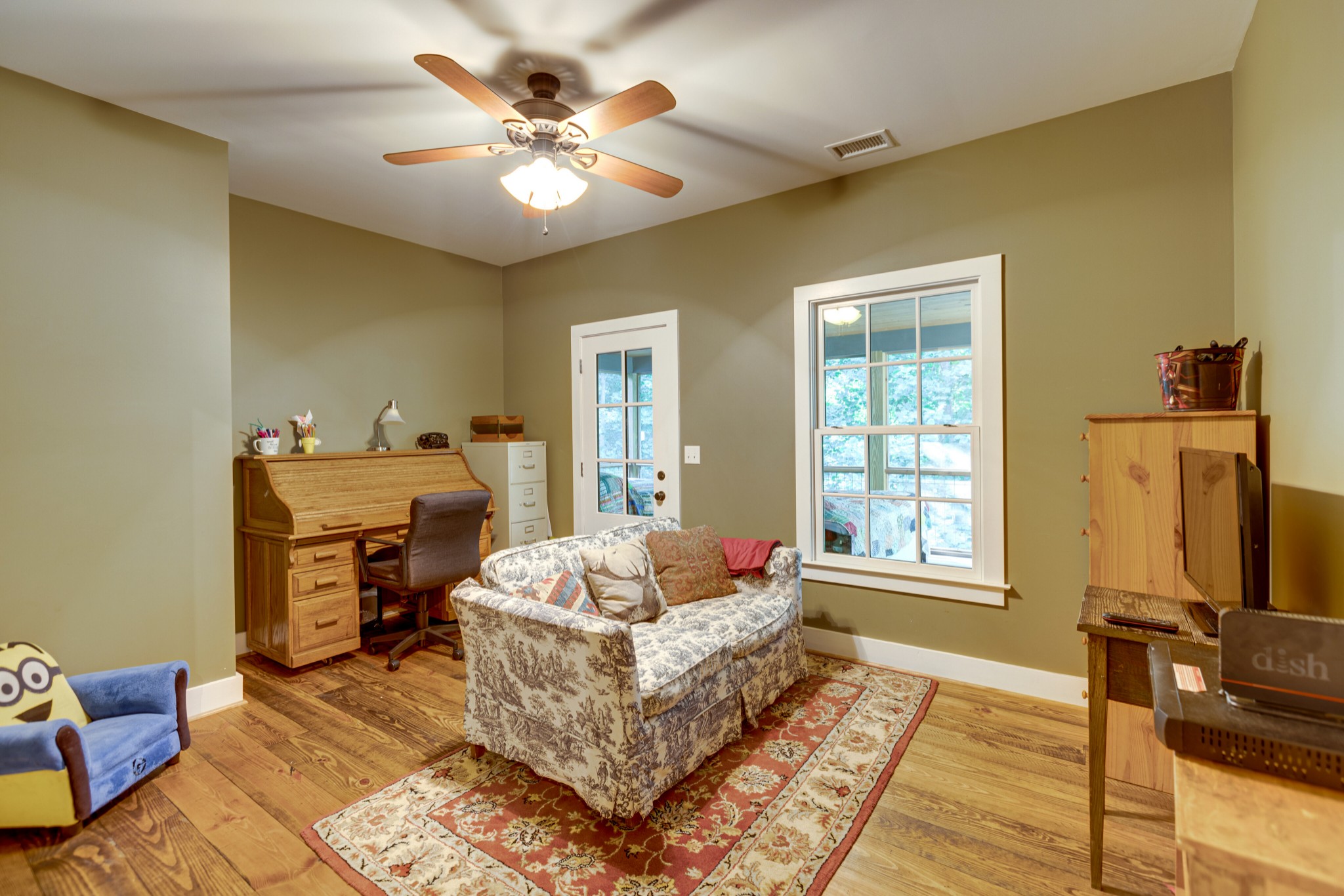 5184 Fire Tower Road Franklin, TN 37064 - Photo 29 of 53 a living room with furniture fireplace and a flat screen tv
