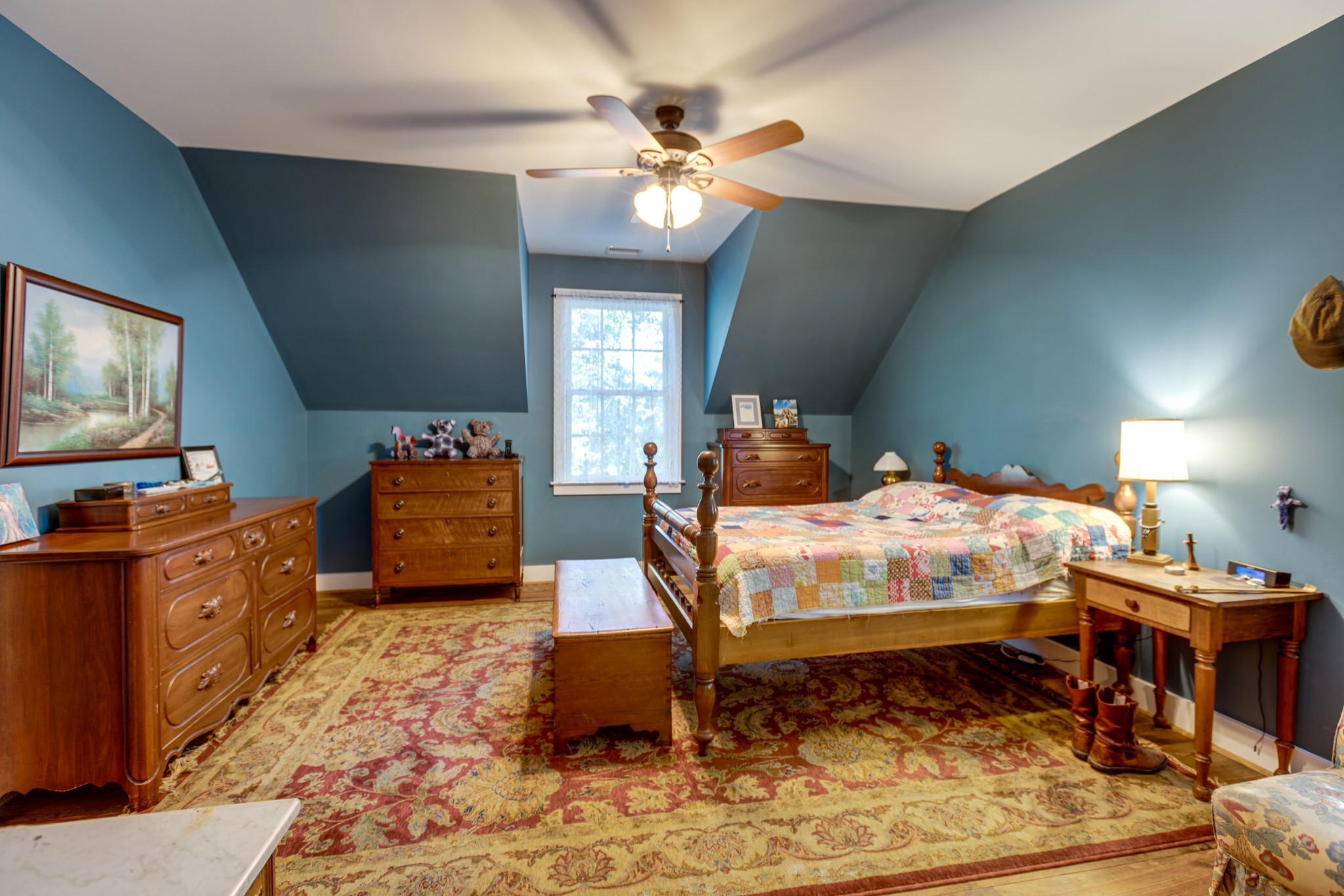 5184 Fire Tower Road Franklin, TN 37064 - Photo 32 of 53 a bedroom with a bed and a flat tv screen on dresser