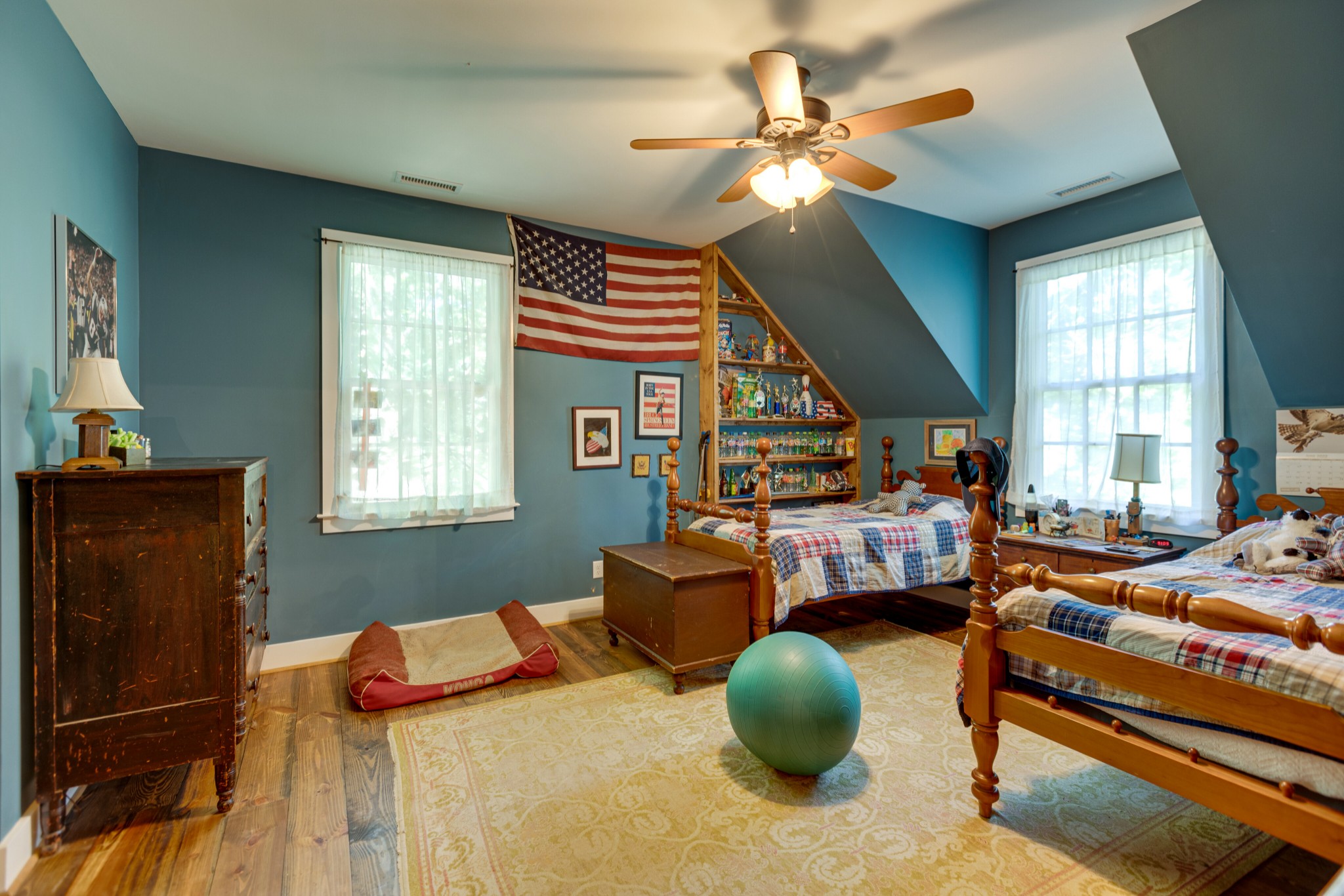 5184 Fire Tower Road Franklin, TN 37064 - Photo 35 of 53 a bedroom with furniture and a chandelier