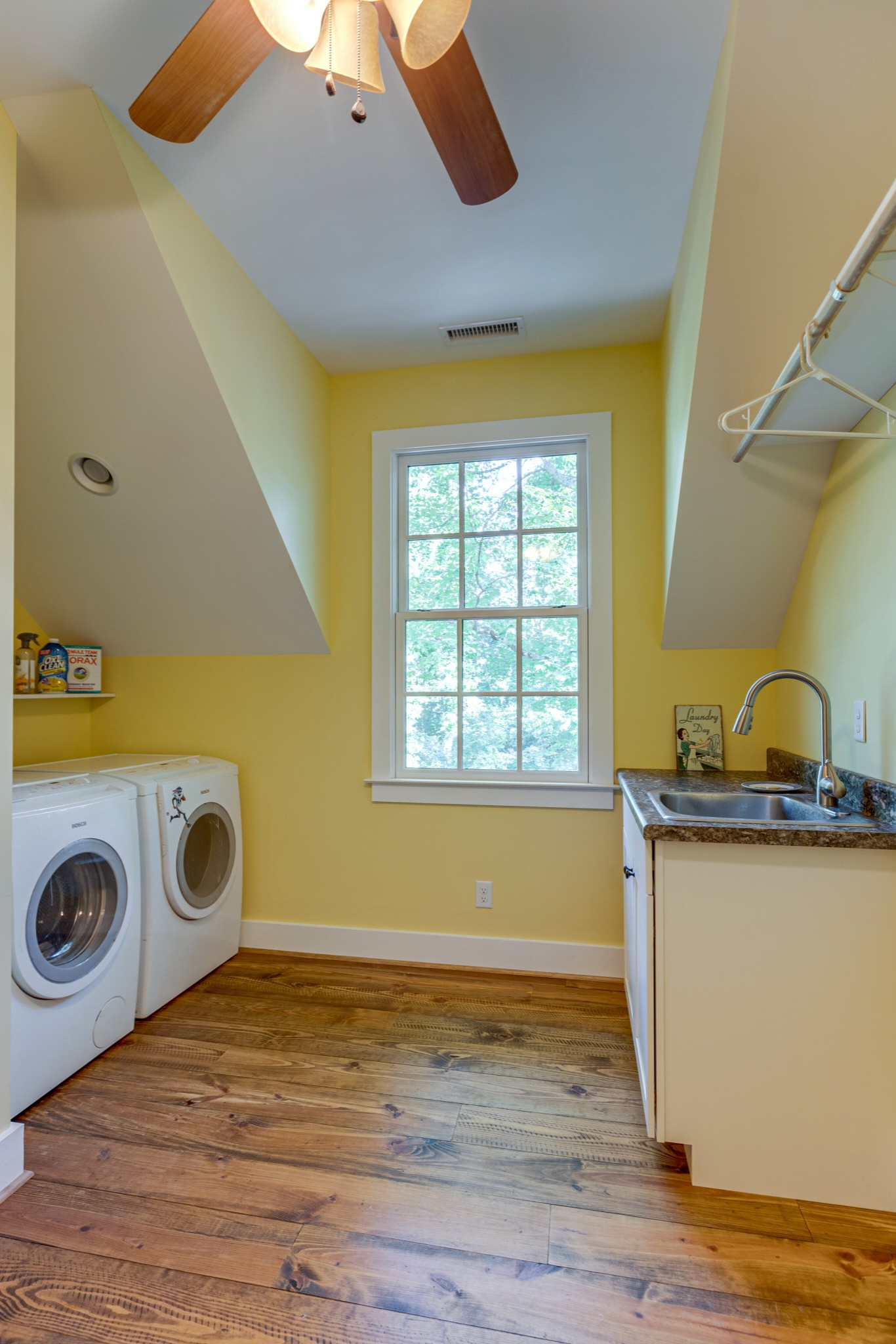 5184 Fire Tower Road Franklin, TN 37064 - Photo 37 of 53 a view of a kitchen with a sink and wooden floor