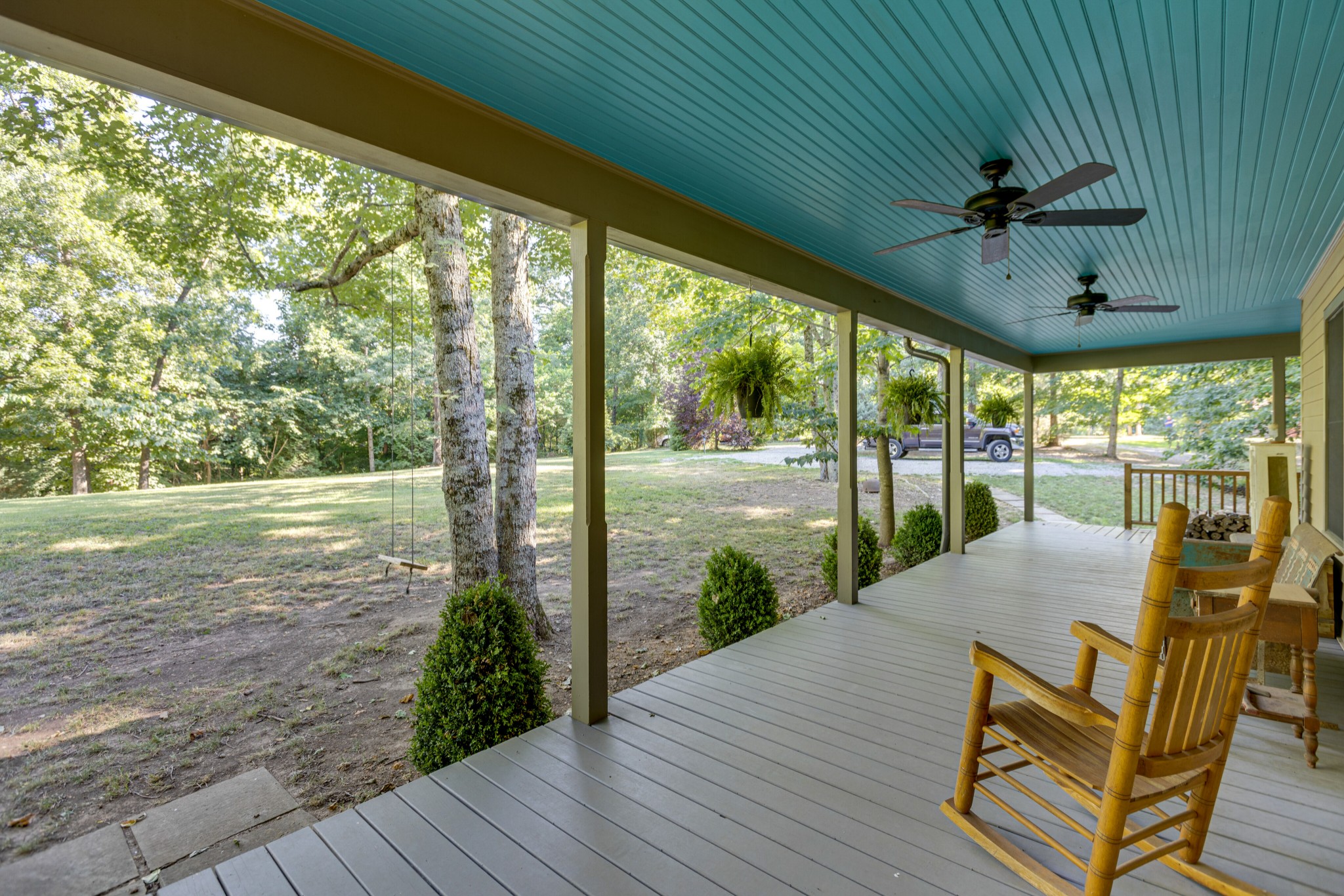 5184 Fire Tower Road Franklin, TN 37064 - Photo 7 of 53 a view of a patio with a table chairs and a patio