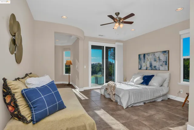 a kitchen that has a sink and a stove in it