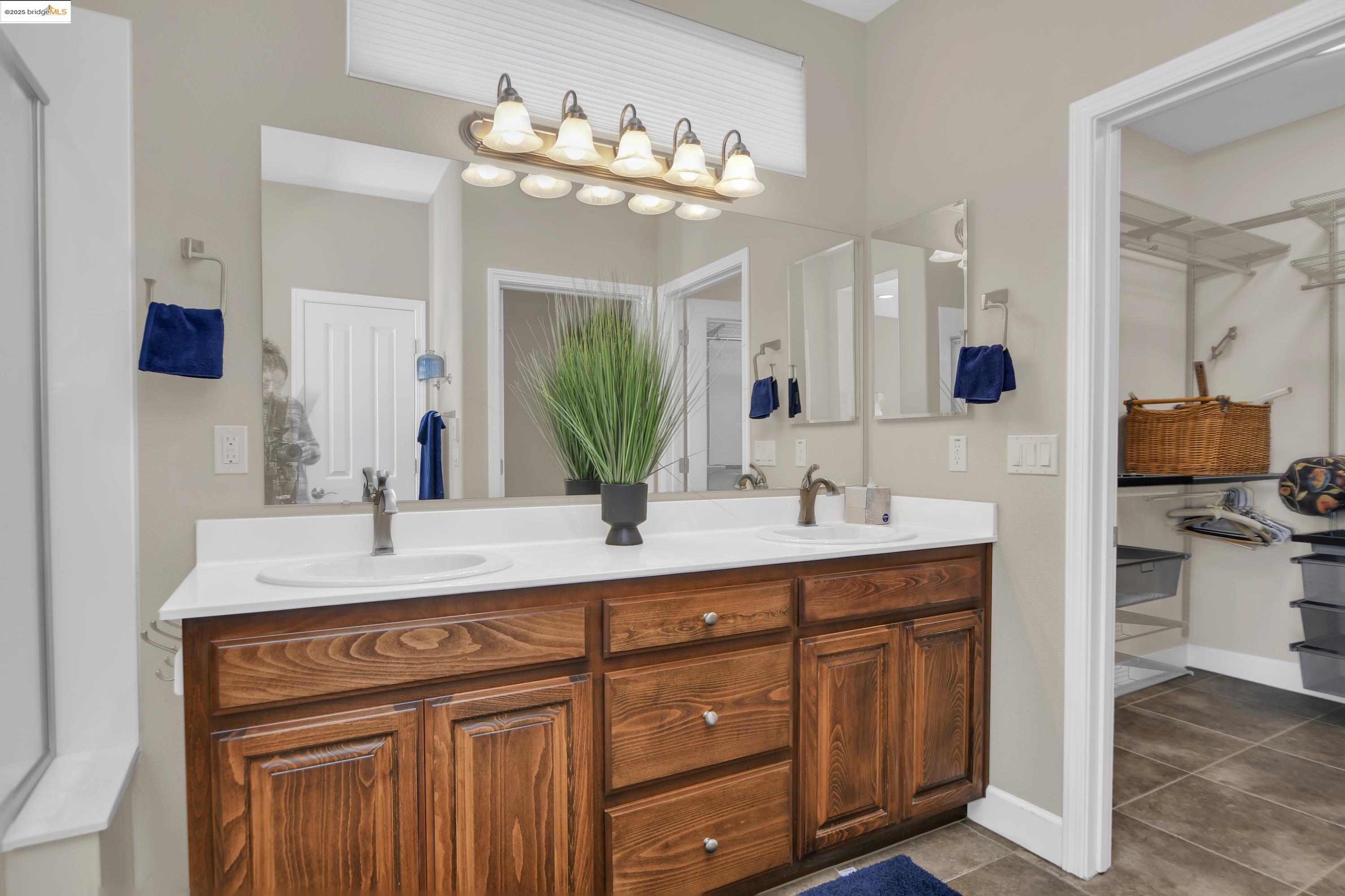 353 Desert Forest Court Rio Vista, CA 94571 - Photo 28 of 39 a bathroom with a sink double vanity and a mirror