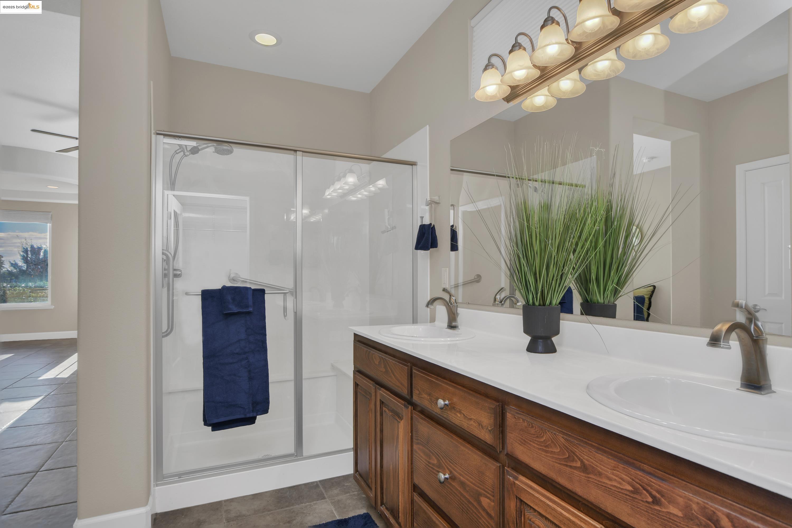 353 Desert Forest Court Rio Vista, CA 94571 - Photo 30 of 39 a bathroom with a sink and a mirror