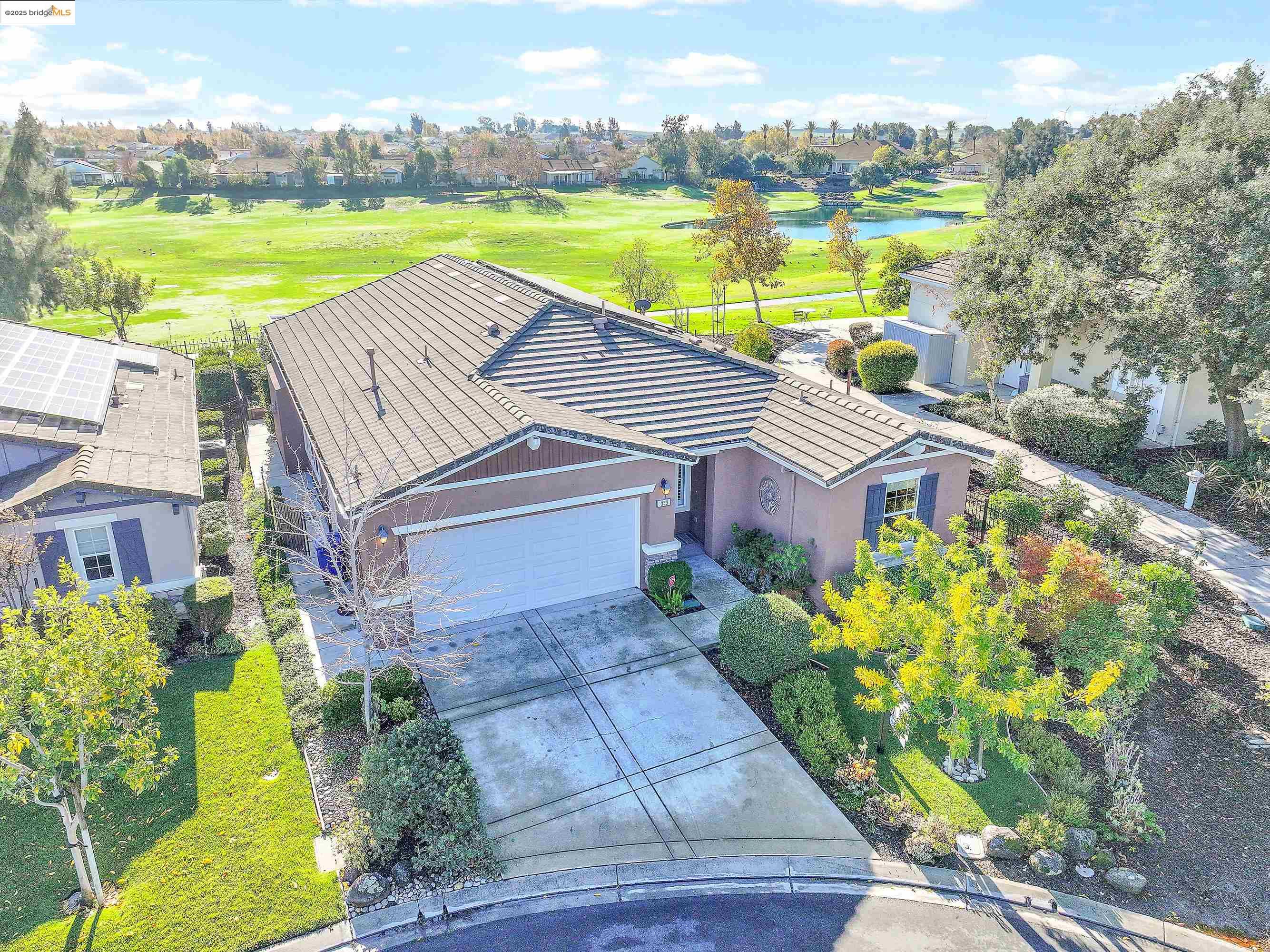 353 Desert Forest Court Rio Vista, CA 94571 - Photo 7 of 39 a aerial view of a house with a big yard and potted plants