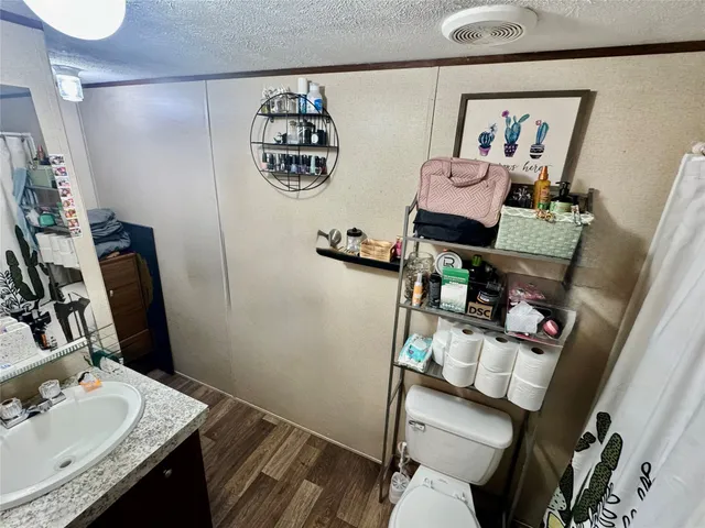 a room with furniture and wooden floor