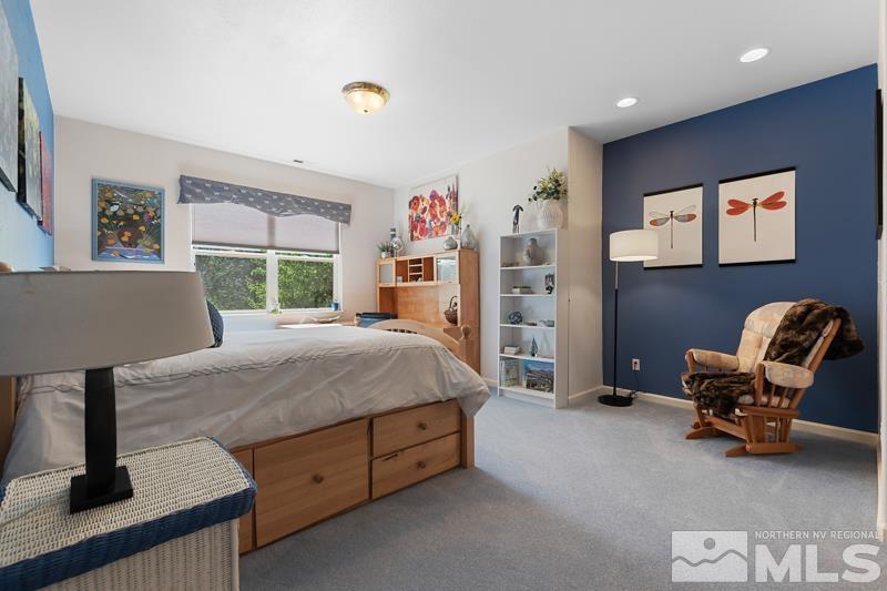 3521 South Cheechako Circle Reno, NV 89519 - Photo 26 of 40 a bed room with a bed and a chair