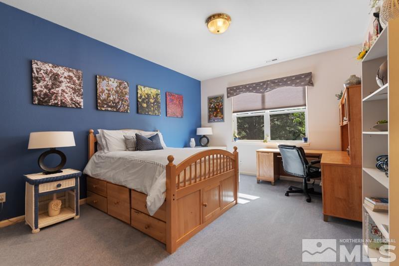 3521 South Cheechako Circle Reno, NV 89519 - Photo 27 of 40 a bedroom with a bed and a window
