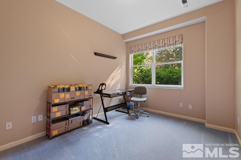 3521 South Cheechako Circle Reno, NV 89519 - Photo 30 of 40 a view of a workspace with furniture and a window