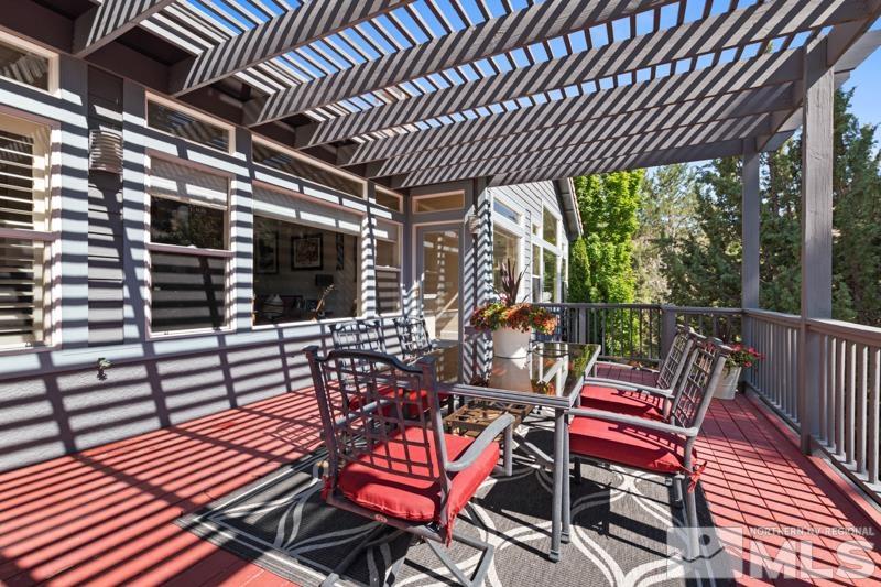3521 South Cheechako Circle Reno, NV 89519 - Photo 33 of 40 a view of a chairs and table in the patio