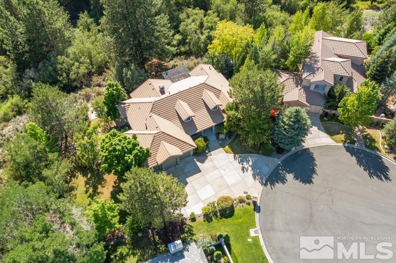 3521 South Cheechako Circle Reno, NV 89519 - Photo 40 of 40 an aerial view of a house with a yard and a large tree