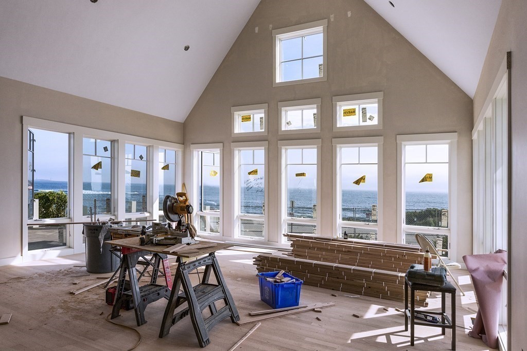 169 Atlantic Road Gloucester, MA 01930 - Photo 14 of 24 a living room filled with furniture and a large window