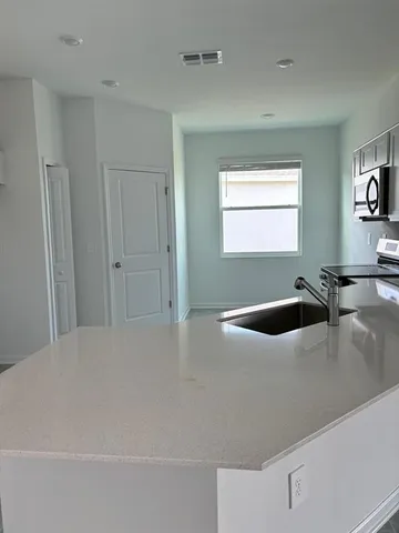 a view of a car in front of a house