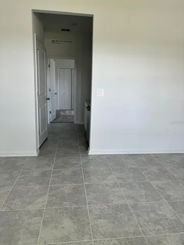 a view of a bathroom with a sink and a shower