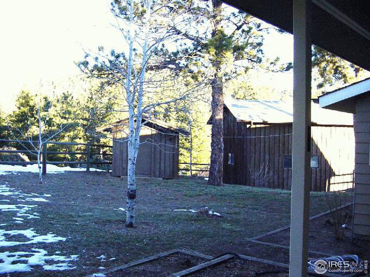 228 Stratton Park Road Bellvue, CO 80512 - Photo 12 of 12 a house view with backyard space