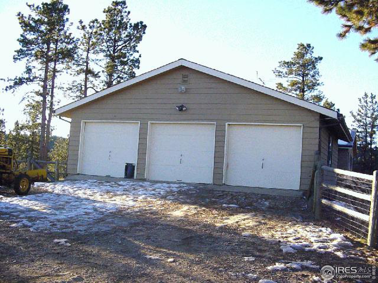 228 Stratton Park Road Bellvue, CO 80512 - Photo 2 of 12 a view of a house with a yard
