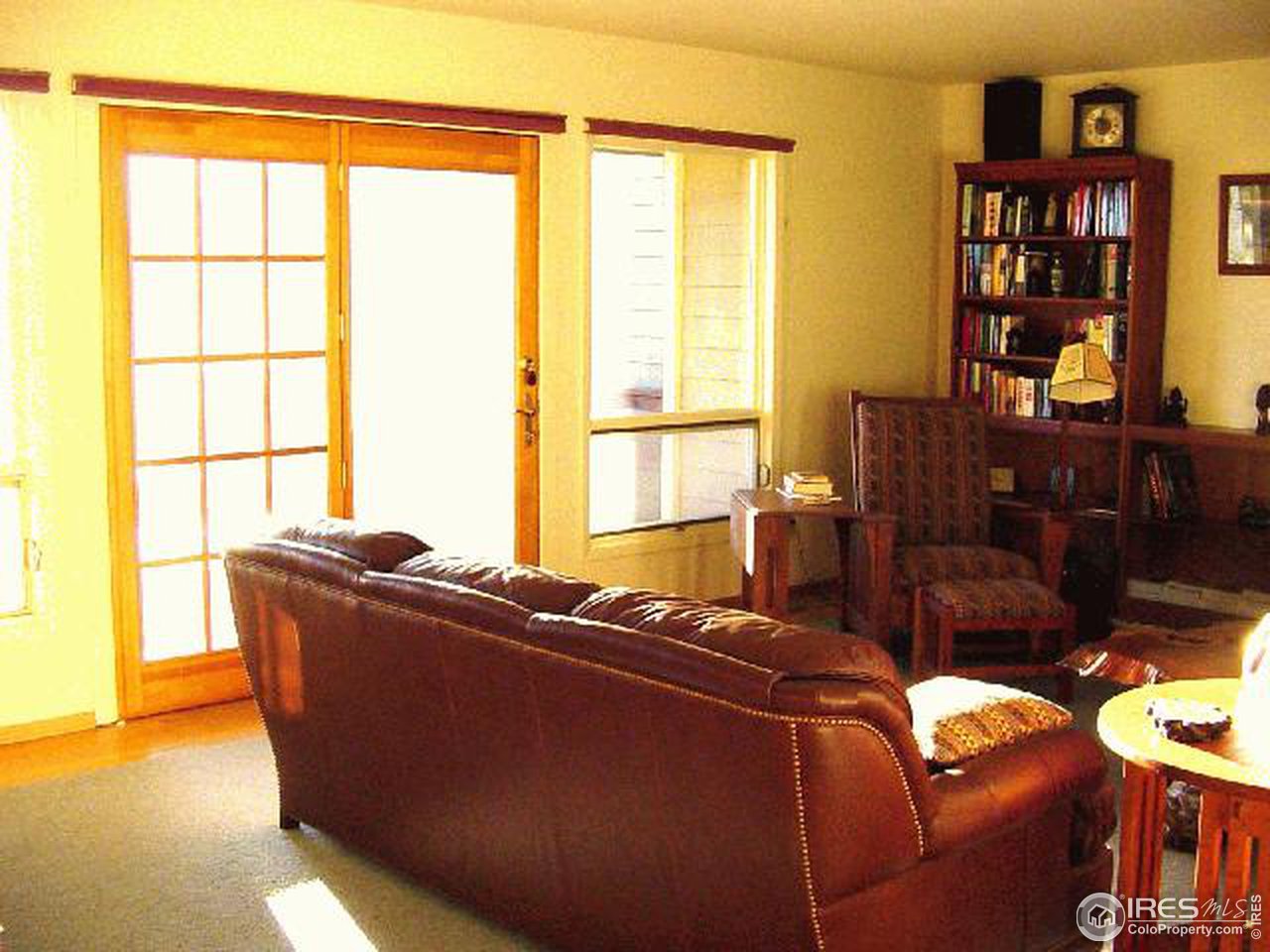 228 Stratton Park Road Bellvue, CO 80512 - Photo 5 of 12 a living room with furniture and a window