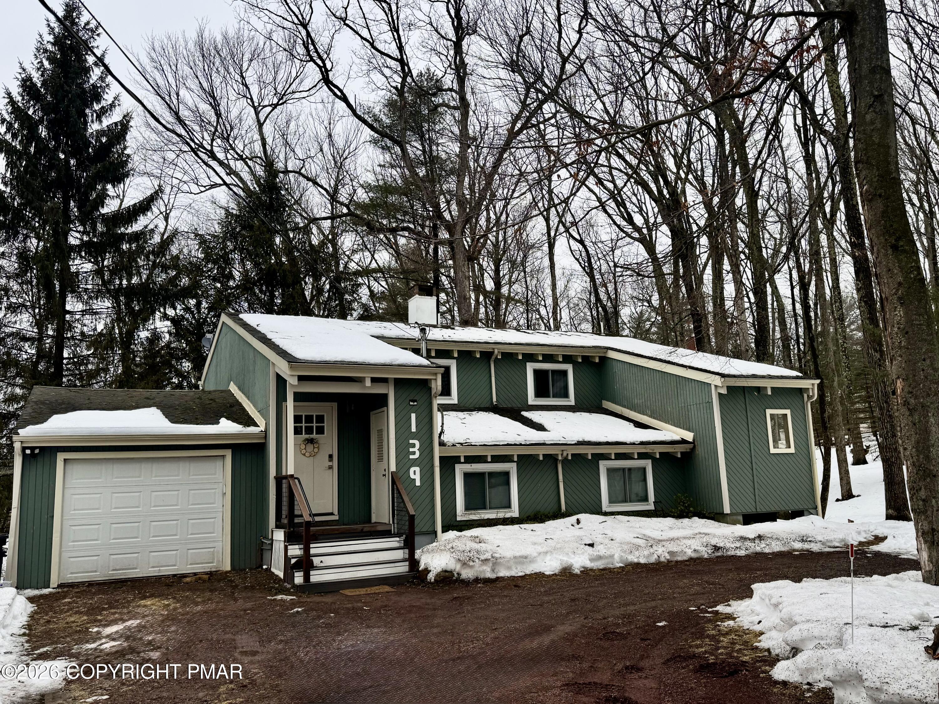 9 Sassafras Road Lake Harmony, PA 18624 - Photo 1 of 35 a front view of a house with a yard
