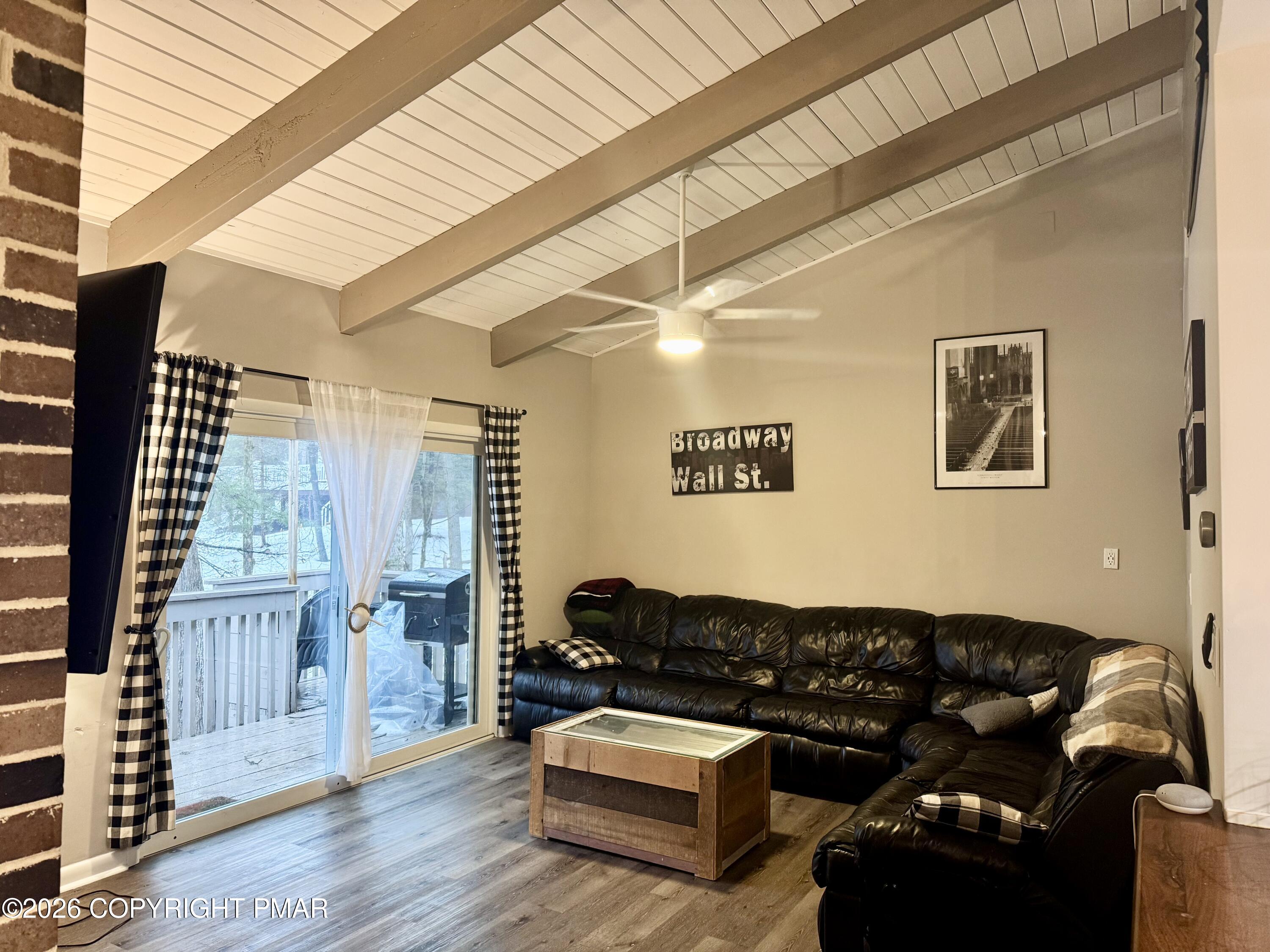 9 Sassafras Road Lake Harmony, PA 18624 - Photo 11 of 35 a living room with furniture and wooden floor