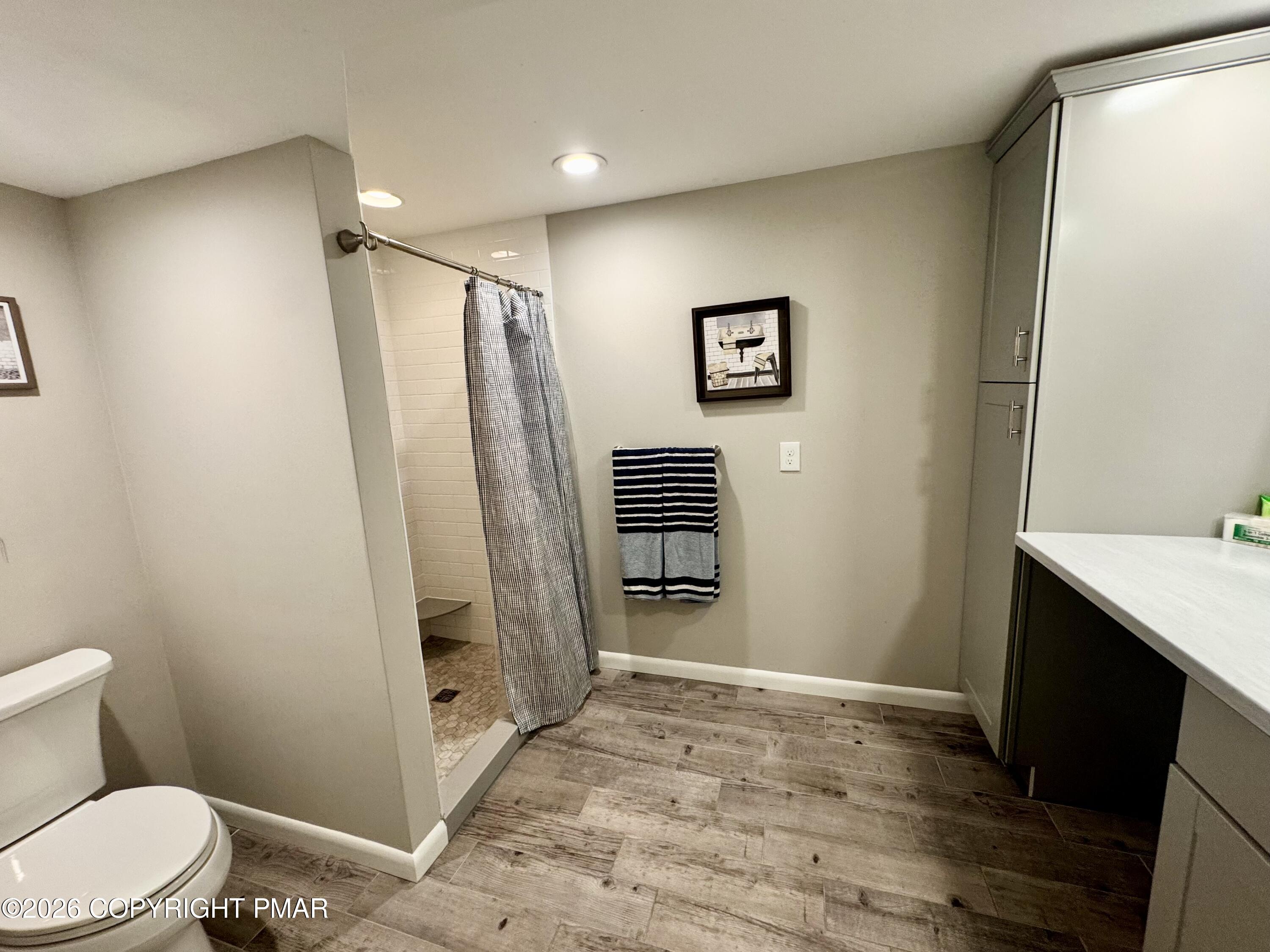 9 Sassafras Road Lake Harmony, PA 18624 - Photo 17 of 35 a bathroom with a sink toilet and shower