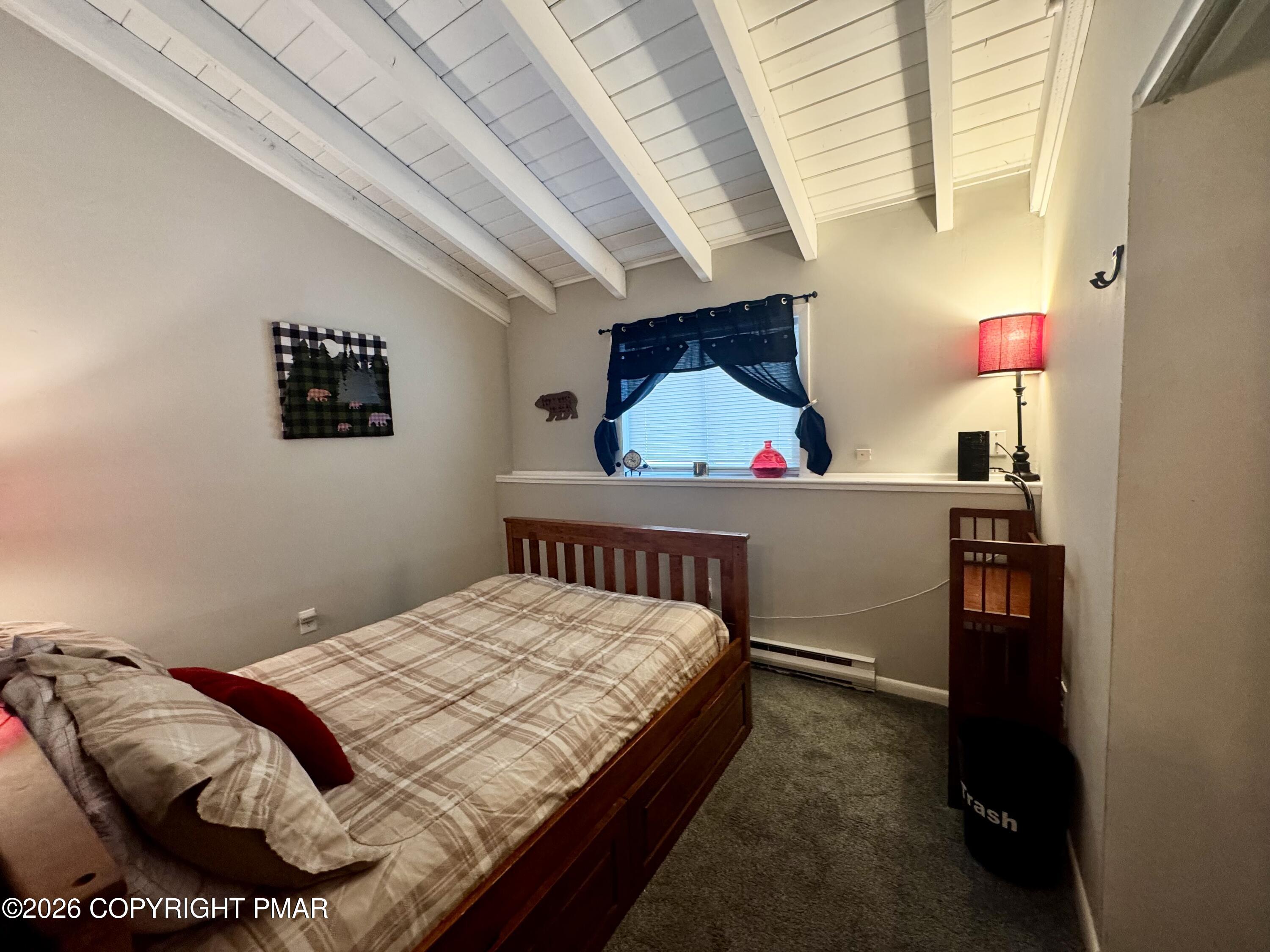 9 Sassafras Road Lake Harmony, PA 18624 - Photo 23 of 35 a bedroom with a bed and a window